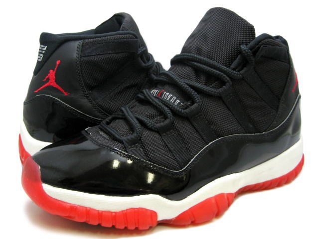 black and red shiny jordans